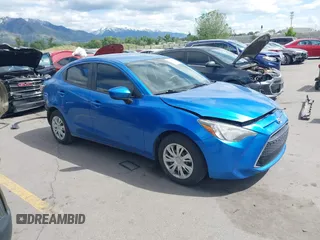 2019 Toyota Yaris L z VIN 3MYDLBYV2KY520621, wystawiony jako IAAI lot #42278402 z przebiegiem 57 118 mil mil oraz . Historia ofert i sprzedaży dostępna na DreamBid. Obrazek 1.