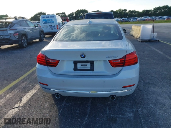 2014 BMW 4 Series 435i with VIN WBA3R1C51EK192795, listed as a IAAI auction lot 41263037 with 22,937 mi miles and . Bid and sale history available at DreamBid. Image 16.