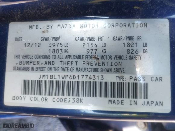 2013 Mazda Mazda3 i Grand Touring with VIN JM1BL1WP6D1774313, listed as a IAAI auction lot 41289254 with 105,283 mi miles. Bid and sale history available at carsss.com. Image 9.