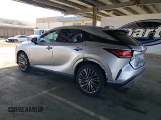2024 Lexus RX 450h+ Luxury with VIN JTJCJMGA5R2012434, listed as a Copart auction lot 58835645 with 10,905 mi miles and Salvage title. Bid and sale history available at DreamBid. Image 2.