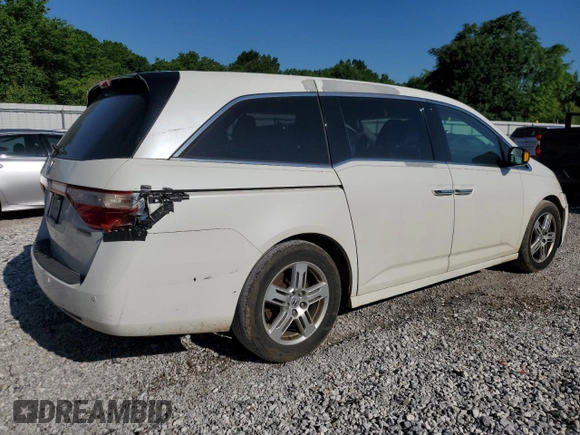 2013 Honda Odyssey Touring with VIN 5FNRL5H90DB003003, listed as a Copart auction lot 58519345 with 259,383 mi miles and Salvage title. Bid and sale history available at DreamBid. Image 3.