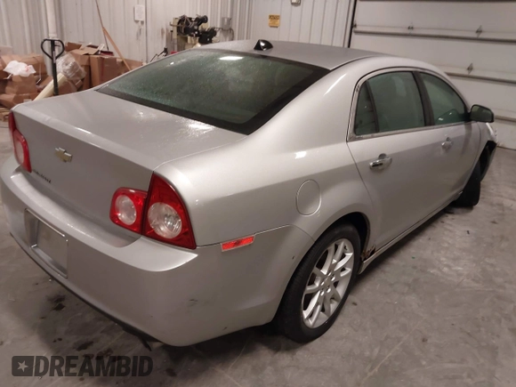 2012 Chevrolet Malibu LTZ with VIN 1G1ZG5E77CF375464, listed as a IAAI auction lot 41509140 with 197,329 mi miles and . Bid and sale history available at DreamBid. Image 4.