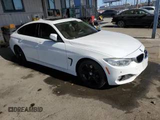 2015 BMW 4 Series 428i with VIN WBA4A9C5XFGL85882, listed as a Copart auction lot 57434445 with 145,765 mi miles and Salvage title. Bid and sale history available at DreamBid. Image 4.