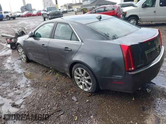 2009 Cadillac CTS AWD z VIN 1G6DT57V790133622, wystawiony jako IAAI lot #42272929 z przebiegiem 124 695 mil mil oraz . Historia ofert i sprzedaży dostępna na DreamBid. Obrazek 3.