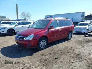 2012 Kia Sedona LX with VIN KNDMG4C7XC6432786, listed as a IAAI auction lot 41808036 with 158,665 mi miles. Bid and sale history available at carsss.com. Image 2.