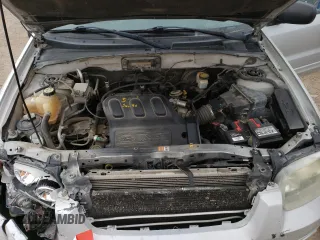 2004 Ford Escape Limited with VIN 1FMCU94184KB62778, listed as a Copart auction lot 70992184 with 165,199 mi miles and Salvage Title. Bid and sale history available at carsss.com. Image 13.