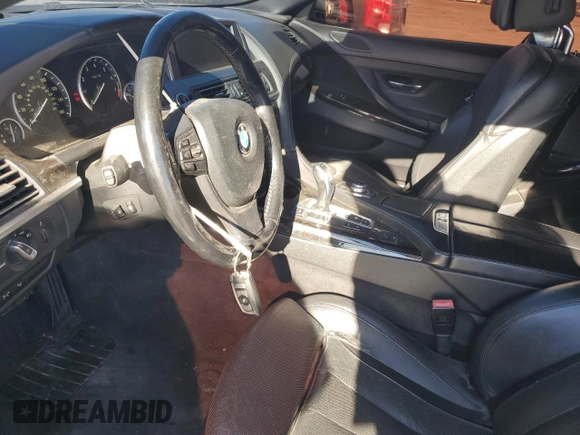 2012 BMW 6 Series 650i z VIN WBALZ3C50CC397706, wystawiony jako Copart lot #89402265 z przebiegiem 92 186 mil mil oraz Szkoda całkowita • Salvage title. Historia ofert i sprzedaży dostępna na DreamBid. Obrazek 7.