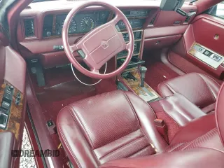 1989 Chrysler LeBaron z VIN 1C3XJ45J8KG223051, wystawiony jako Copart lot #75115464 z przebiegiem 27 923 mil mil oraz Szkody całkowita. Historia ofert i sprzedaży dostępna na DreamBid. Obrazek 8.