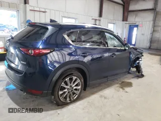 2021 Mazda CX-5 Grand Touring with VIN JM3KFBDM3M0327635, listed as a Copart auction lot 49980635 with 47,160 mi miles and Salvage Title. Bid and sale history available at carsss.com. Image 3.
