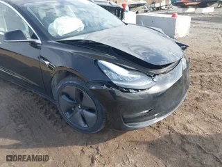 2019 Tesla Model 3 Long Range with VIN 5YJ3E1EB5KF414748, listed as a IAAI auction lot 41778914 with 0 mi miles. Bid and sale history available at carsss.com. Image 19.