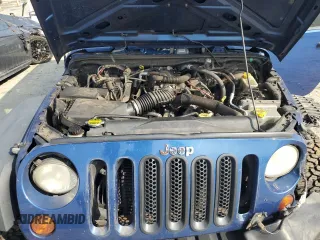 2009 Jeep Wrangler Unlimited Rubicon z VIN 1J4GA69179L763259, wystawiony jako Copart lot #44161645 z przebiegiem 153 146 mil mil oraz Szkoda całkowita • Salvage title. Historia ofert i sprzedaży dostępna na DreamBid. Obrazek 12.