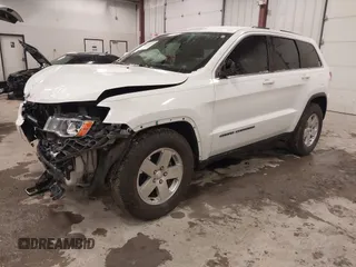 2017 Jeep Grand Cherokee Laredo with VIN 1C4RJEAG9HC854492, listed as a IAAI auction lot 41184619 with 134,839 mi miles. Bid and sale history available at carsss.com. Image 17.