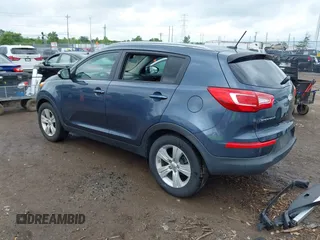 2013 Kia Sportage LX with VIN KNDPB3A26D7452008, listed as a IAAI auction lot 42435597 with 109,397 mi miles and . Bid and sale history available at DreamBid. Image 3.