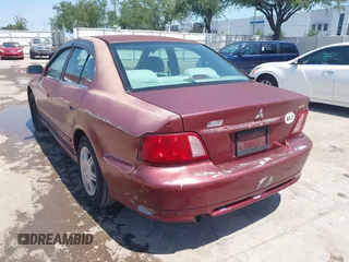 2003 Mitsubishi Galant ES z VIN 4A3AA46G83E216938, wystawiony jako IAAI lot #42191226 z przebiegiem Nie podano mil oraz . Historia ofert i sprzedaży dostępna na DreamBid. Obrazek 3.