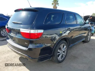 2013 Dodge Durango R/T with VIN 1C4SDHCT2DC530301, listed as a IAAI auction lot 42008853 with 186,148 mi miles and . Bid and sale history available at DreamBid. Image 4.
