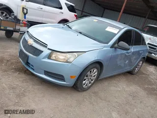 2011 Chevrolet Cruze LS with VIN 1G1PC5SH7B7103215, listed as a IAAI auction lot 41185833 with 140,867 mi miles. Bid and sale history available at carsss.com. Image 2.