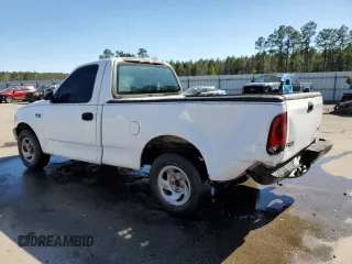 2001 Ford F-150 XL z VIN 1FTZF17231NA07581, wystawiony jako Copart lot #50421255 z przebiegiem 316 753 mil mil oraz Szkoda całkowita • Salvage title. Historia ofert i sprzedaży dostępna na DreamBid. Obrazek 2.