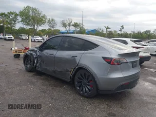 2024 Tesla Model Y Performance with VIN 7SAYGDEF3RA307468, listed as a IAAI auction lot 41805853 with 10,377 mi miles and . Bid and sale history available at DreamBid. Image 3.