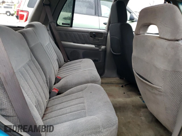 1995 Chevrolet Blazer z VIN 1GNDT13W4S2154787, wystawiony jako Copart lot #85719274 z przebiegiem 167 242 mil mil oraz Nie do naprawy • Non repairable. Historia ofert i sprzedaży dostępna na DreamBid. Obrazek 11.
