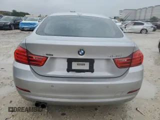2015 BMW 4 Series 428i xDrive с VIN WBA4C9C59FD330853, выставлен на аукционе Copart как лот 52130785 с пробегом 128 618 миль миль и Списание • Salvage title. История ставок и продаж доступна на DreamBid. Изображение 6.