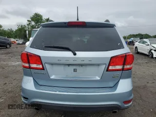2013 Dodge Journey SXT with VIN 3C4PDCBG0DT619382, listed as a Copart auction lot 56565205 with 176,112 mi miles and Salvage title. Bid and sale history available at DreamBid. Image 6.