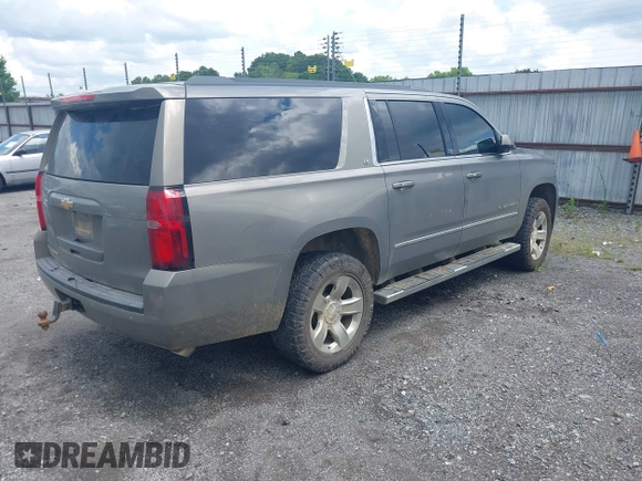 2017 Chevrolet Suburban LT with VIN 1GNSKHKC7HR356677, listed as a IAAI auction lot 42491581 with 129,496 mi miles and . Bid and sale history available at DreamBid. Image 4.