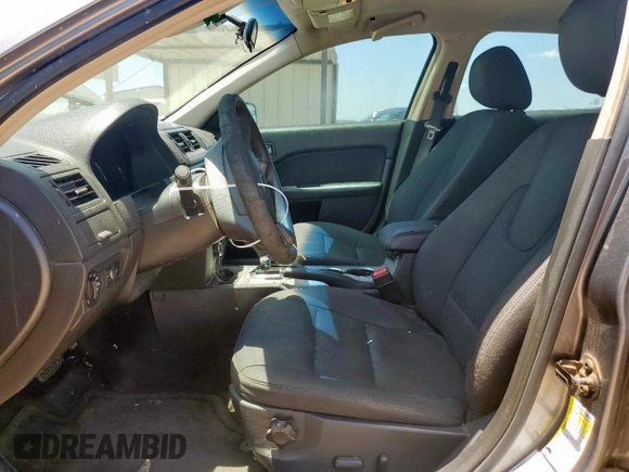 2012 Ford Fusion SE with VIN 3FAHP0HA9CR435931, listed as a Copart auction lot 61633525 with 169,561 mi miles and Salvage title. Bid and sale history available at DreamBid. Image 7.