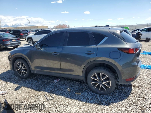 2018 Mazda CX-5 Touring z VIN JM3KFACM5J0338126, wystawiony jako Copart lot #56185795 z przebiegiem 115 254 mil mil oraz Szkoda całkowita • Salvage title. Historia ofert i sprzedaży dostępna na DreamBid. Obrazek 2.