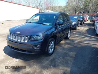 2014 Jeep Compass Latitude with VIN 1C4NJDEB3ED816351, listed as a IAAI auction lot 41882146 with 129,074 mi miles. Bid and sale history available at carsss.com. Image 2.