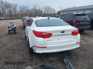2015 Kia Optima LX with VIN KNAGM4A72F5654352, listed as a IAAI auction lot 41706156 with 119,000 mi miles. Bid and sale history available at carsss.com. Image 3.
