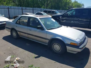 1996 Honda Accord Value z VIN 1HGCD5691TA248522, wystawiony jako IAAI lot #42472778 z przebiegiem 173 915 mil mil oraz . Historia ofert i sprzedaży dostępna na DreamBid. Obrazek 1.