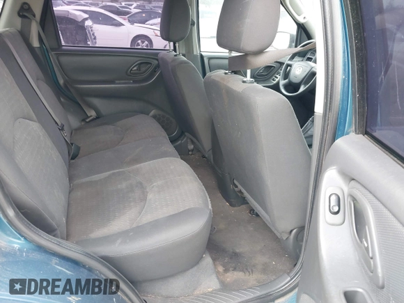 2005 Mazda Tribute i with VIN 4F2YZ02Z85KM19097, listed as a IAAI auction lot 41547466 with 121,709 mi miles and . Bid and sale history available at carsss.com. Image 8.