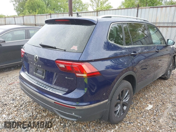 2022 Volkswagen Tiguan SE with VIN 3VV2B7AX8NM098143, listed as a IAAI auction lot 42209345 with 32,891 mi miles and . Bid and sale history available at DreamBid. Image 4.