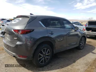 2018 Mazda CX-5 Grand Touring z VIN JM3KFBDM4J0300519, wystawiony jako Copart lot #51548745 z przebiegiem 102 853 mil mil oraz Szkoda całkowita • Salvage title. Historia ofert i sprzedaży dostępna na DreamBid. Obrazek 3.
