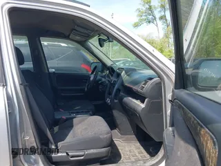 2005 Honda CR-V LX with VIN JHLRD78525C040139, listed as a IAAI auction lot 42097811 with 306,718 mi miles. Bid and sale history available at carsss.com. Image 5.