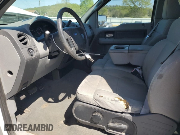 2007 Ford F-150 STX with VIN 1FTRX12W07FB65483, listed as a Copart auction lot 53343795 with 211,803 mi miles and Salvage Title. Bid and sale history available at DreamBid. Image 7.