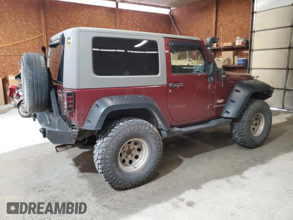 2007 Jeep Wrangler Sahara z VIN 1J4FA54127L132543, wystawiony jako Copart lot #55891995 z przebiegiem 74 616 mil mil oraz Szkoda całkowita • Salvage title. Historia ofert i sprzedaży dostępna na DreamBid. Obrazek 3.