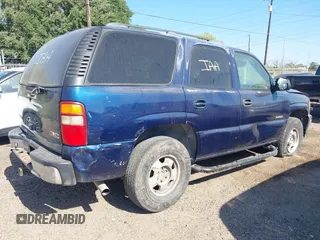 2003 GMC Yukon SLT with VIN 1GKEC13V13R212713, listed as a IAAI auction lot 42015270 with 1 mi miles. Bid and sale history available at carsss.com. Image 4.
