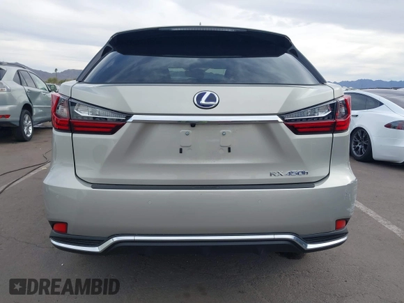 2021 Lexus RX 450h with VIN 2T2HGMDA0MC067228, listed as a IAAI auction lot 41818836 with 28,850 mi miles and . Bid and sale history available at DreamBid. Image 16.