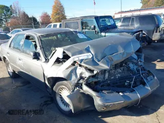 1999 Mercury Grand Marquis LS with VIN 2MEFM75W1XX710734, listed as a IAAI auction lot 40931266 with 211,694 mi miles and . Bid and sale history available at DreamBid. Image 1.
