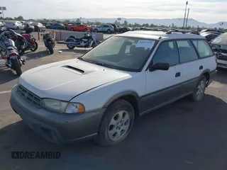 1999 Subaru Legacy Outback z VIN 4S3BG6858X7642460, wystawiony jako IAAI lot #40957251 z przebiegiem 206 546 mil mil oraz . Historia ofert i sprzedaży dostępna na DreamBid. Obrazek 2.