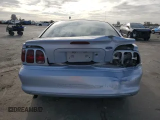 1996 Ford Mustang with VIN 1FALP4047TF106715, listed as a Copart auction lot 78658044 with 60,205 mi miles and Salvage Title. Bid and sale history available at carsss.com. Image 6.