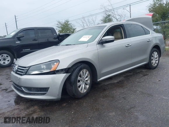 2012 Volkswagen Passat SE with VIN 1VWBH7A36CC077412, listed as a IAAI auction lot 41651796 with 113,259 mi miles and . Bid and sale history available at DreamBid. Image 2.