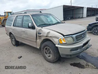 1997 Ford Expedition XLT z VIN 1FMEU1765VLB24163, wystawiony jako IAAI lot #42303093 z przebiegiem 137 427 mil mil oraz . Historia ofert i sprzedaży dostępna na DreamBid. Obrazek 1.