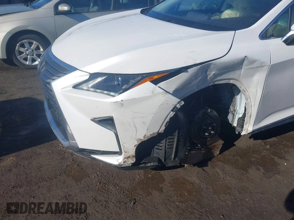 2018 Lexus RX 350 z VIN 2T2BZMCAXJC161520, wystawiony jako IAAI lot #41357954 z przebiegiem 105 427 mil mil oraz . Historia ofert i sprzedaży dostępna na DreamBid. Obrazek 6.