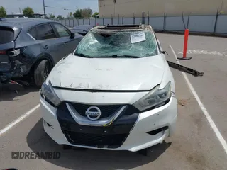 2016 Nissan Maxima SV z VIN 1N4AA6AP2GC437206, wystawiony jako IAAI lot #42082780 z przebiegiem Nie podano mil oraz . Historia ofert i sprzedaży dostępna na DreamBid. Obrazek 13.