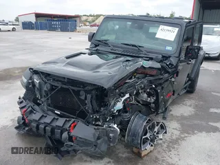 2021 Jeep Wrangler Unlimited Rubicon with VIN 1C4HJXFG7MW662092, listed as a IAAI auction lot 42139521 with 32,055 mi miles and . Bid and sale history available at carsss.com. Image 6.