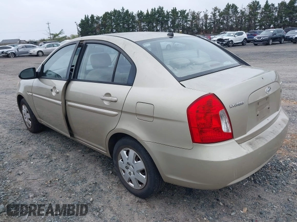 2006 Hyundai Accent GLS z VIN KMHCN46C66U058232, wystawiony jako IAAI lot #41899629 z przebiegiem 182 669 mil mil oraz . Historia ofert i sprzedaży dostępna na DreamBid. Obrazek 3.