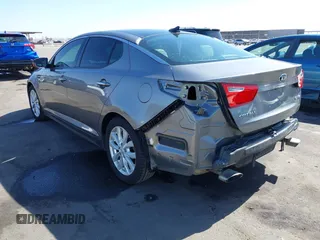 2014 Kia Optima EX z VIN 5XXGN4A72EG339786, wystawiony jako IAAI lot #42328516 z przebiegiem 103 035 mil mil oraz . Historia ofert i sprzedaży dostępna na DreamBid. Obrazek 3.