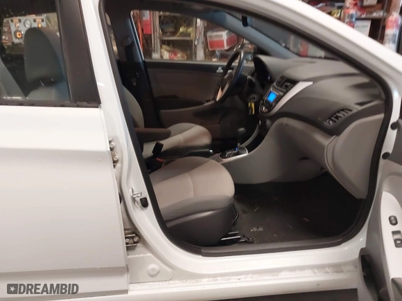 2013 Hyundai Accent GL with VIN KMHCT5AE1DU088241, listed as a IAAI auction lot 41909194 with 87,622 mi miles. Bid and sale history available at carsss.com. Image 5.